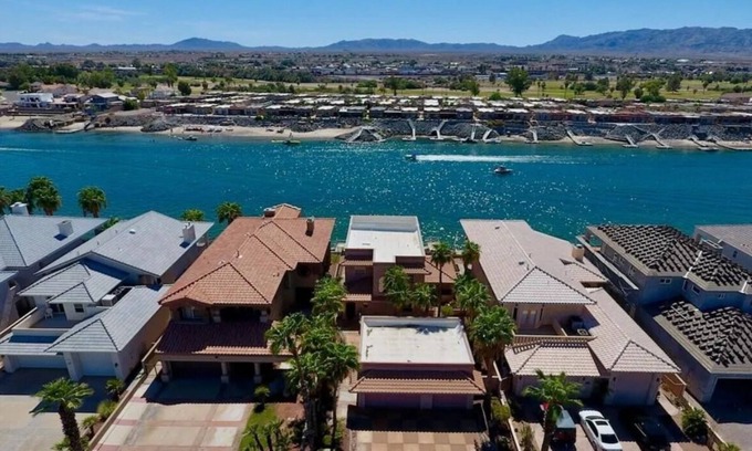 Colorado Shores House | Riverfront Luxury: 4BR Retreat w/Dock, Launch, Endless Views, Colorado Oasis