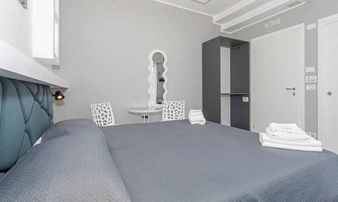Monte Po-Nesima-San Leone-Rapisardi Apartment | Room 'Dolce Relax - Comfort' with Balcony, Wi-Fi and Air Conditioning