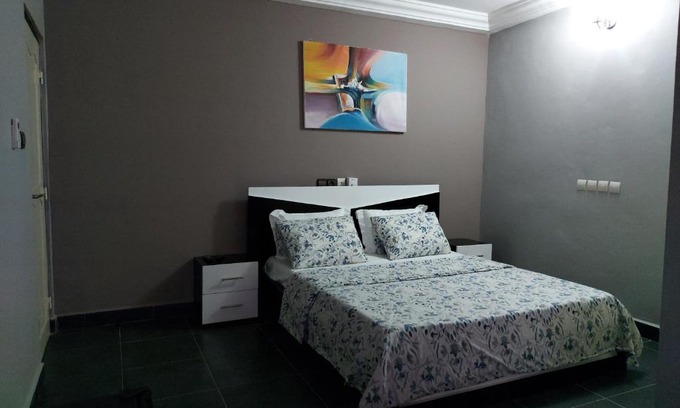 Lome House | Room in Guest room - Royal Blue Guest House Bar