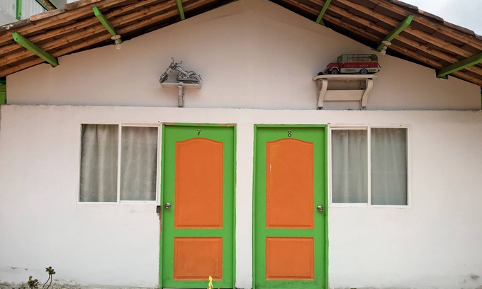 Pereira House | Room with 1 double bed and 2 single beds