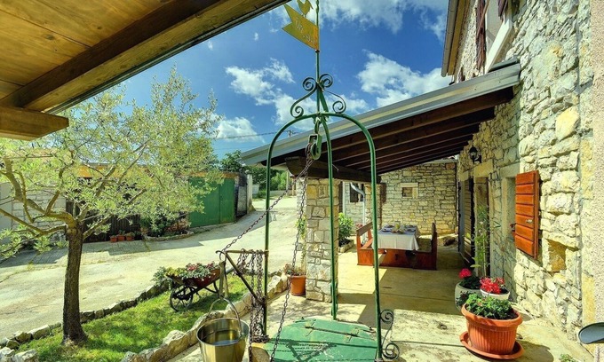 Orihi House | Rustic and modern stone finca with two parking spaces on the property and covered terrace