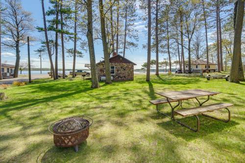Stone Lake House | Rustic Cabin with Fire Pit, Steps to Sand Lake!