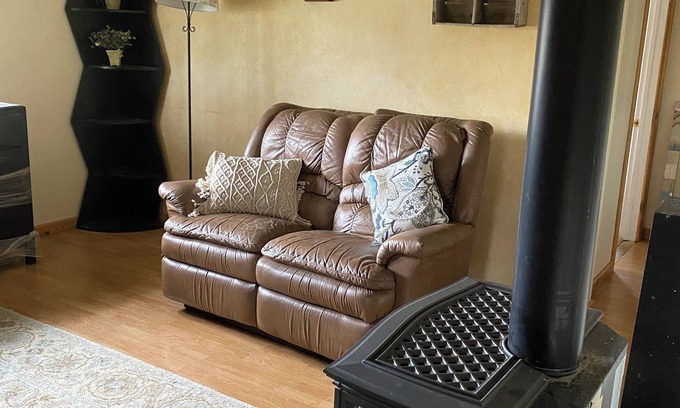 Worland House | Rustic Country 2-bedroom house with gas fireplace.