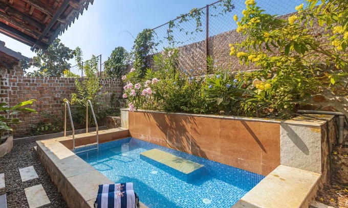 Mahiravani House | SaffronStays Lake House Marigold, Nashik - rustic cottages with private plunge pool