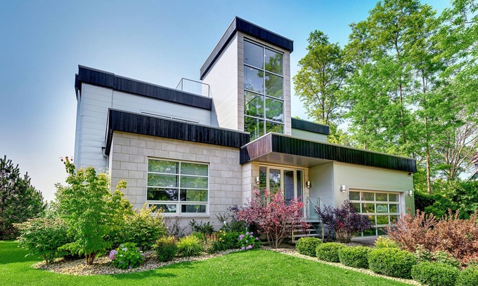 Riverside Villa | Sandy Shores: Stunning Modern Beach House with Sunset views over Lake Michigan