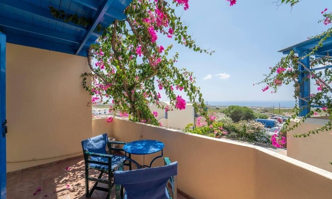 Megalochori Apartment | Santorious Flower Covered Apartment
