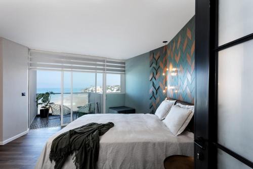 Herzliya Pituach Apartment | Sea View Stylish 1BR with Balcony by Beachfront Stay