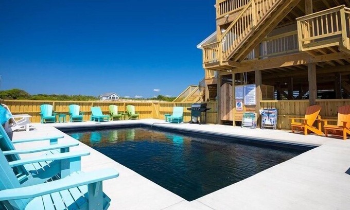 Carova Beach Cottage | "Seabatical" Nice four yo house with a close walk to the beach! 4x4 Required