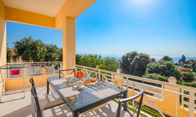 Perama Apartment | SeaSunrise: Modern, spacious Apt, A/C, WiFi, Near beach