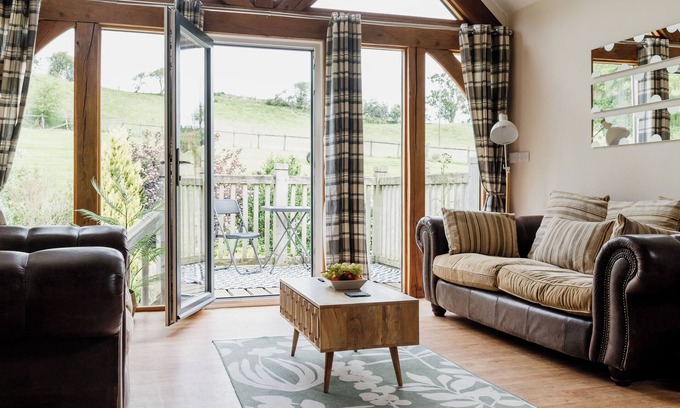 Devils Bridge House | Section of luxury renovated barn with a large hot tub. Sleeping 5