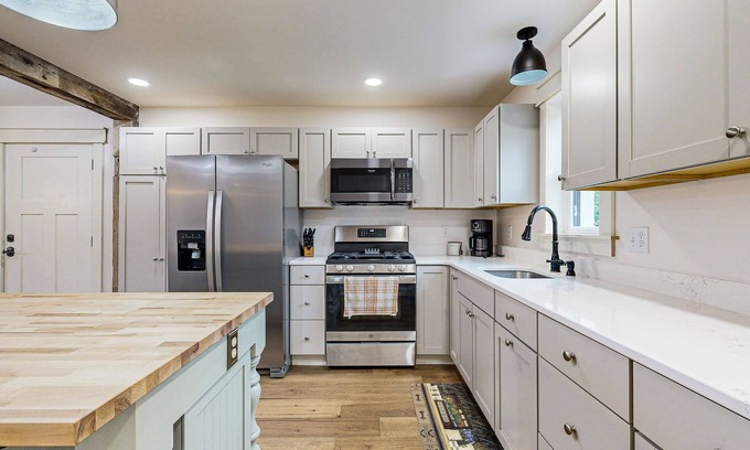 Cooper House | Serene dog friendly lakefront home enjoy swimming, kayaking and peacefulness