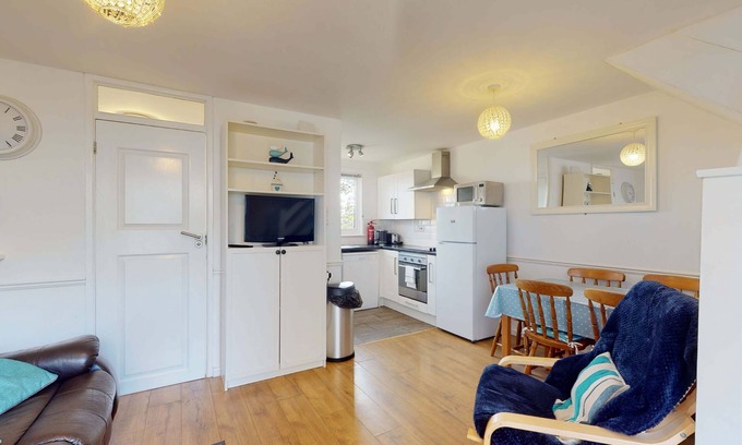 Saint Erth Praze Apartment | Set within the grounds of Tolroy Manor, Strawberry Cottage enjoys use of shared facilities