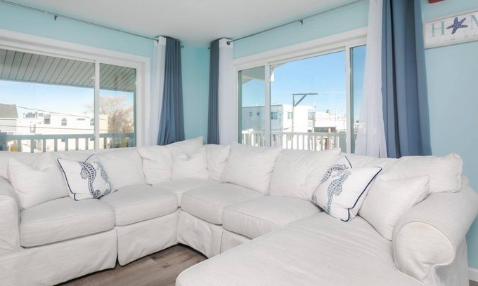 Hampton Condo | Short stroll to the beach! Newly renovated, 3 bedroom condo, wrap around porch