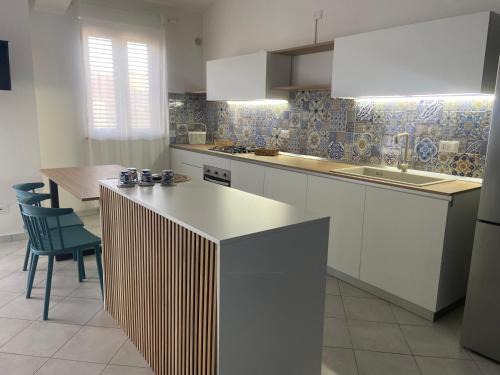 Oliveri Apartment | Sikuli Home