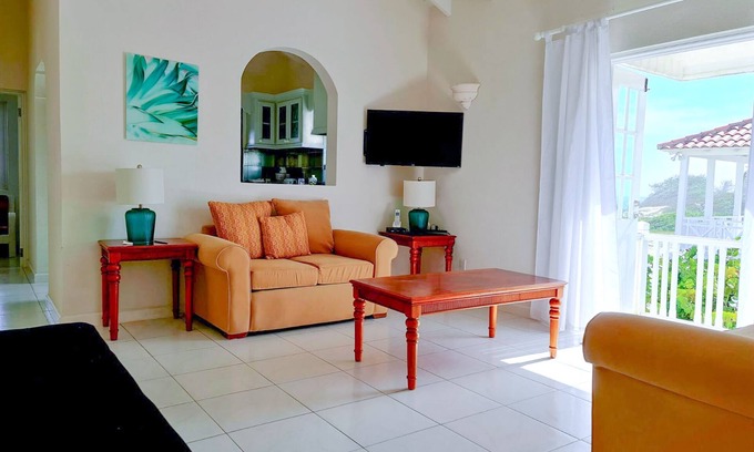 Silver Sands Apartment | Silver Sands Beachfront Condo, Shared Patio - Bar & BBQ, Indoor & Outdoor Dining