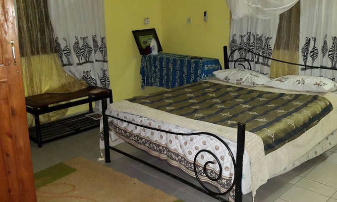 Mbezi Beach Apartment | Simple, Clean Warm, Friendly Home, With A Spacious Room En Suite With Ac