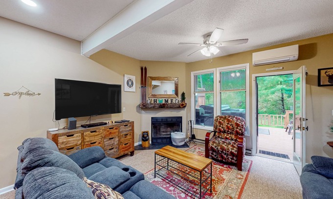 McHenry House | Ski-in/out townhome with free WiFi, wood fireplace, gas grill, & deck - dogs OK