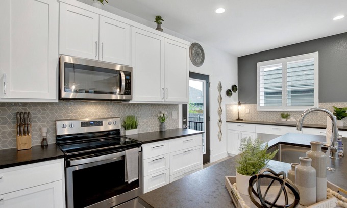 Waterford On Lake Travis House | Soaring 2-level Point Venture Home on Lake Travis