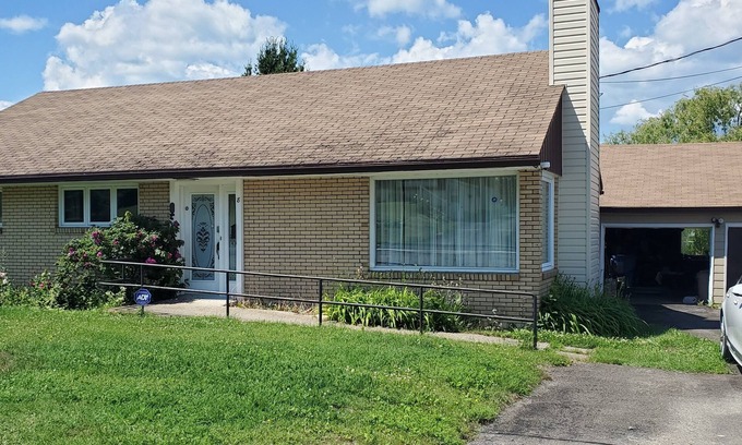 Campbellton House | Solarium overlooking city, river and mountains. Sometimes Northern lights.