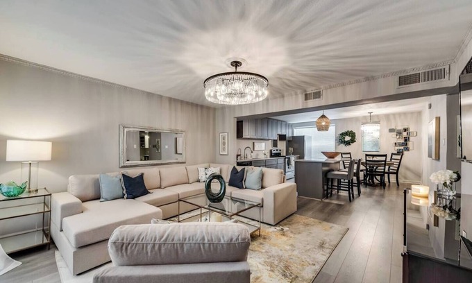 Old East Dallas Condo | Sophisticated 2-Bed, 1.5-Bath furnished condo in central Dallas with a private patio, serene garden views, and exclusive access to an award-winning courtyard equipped with premium wellness products and relaxing lounge areas.