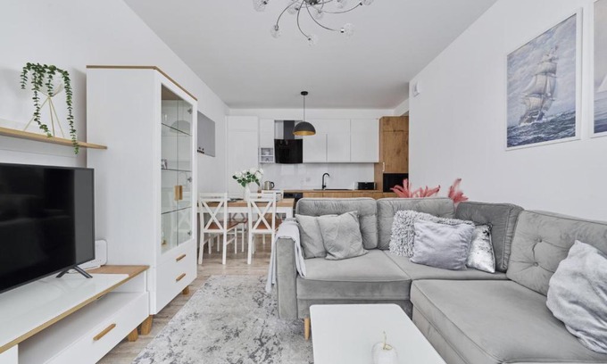 Krzyki Apartment | Spacious Apartment suitable for Remote Work with Balcony & Parking by Noclegi Renters