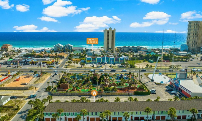 Bel Air House | Spacious Beachside Townhouse with Lagoon access, 2 car garage, and a pool!l