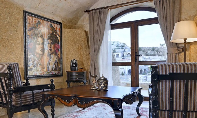 Urgup Hotel | Spacious Cave Room Offering Perfect Backdrop | Outdoor Pool Access