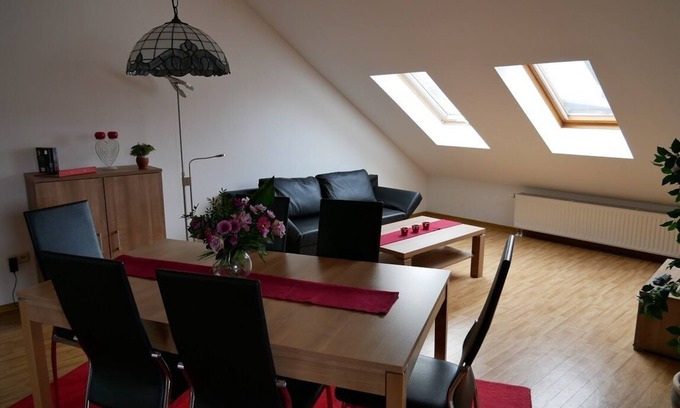 Nordheim a. Main Apartment | Spacious holiday home (100sqm) in the attic with a view of the vineyards