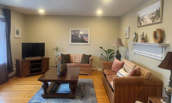 Belmar House | Spacious home with a view of the Shark River and a game room.