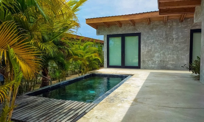 Placencia Villa | Spacious waterfront villa with splash pool, beach access & private terrace
