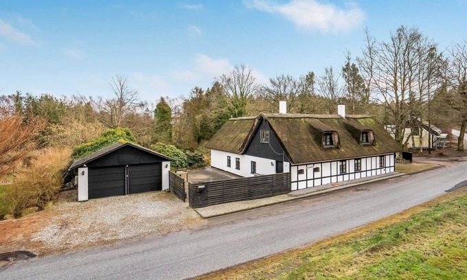 Grenaa House | Spend a nice vacation in this cozy cottage with views over the countryside and large private garden.