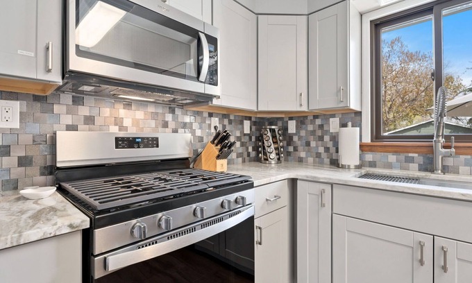 Martinez Park House | Spirit of the Rockies - Private Backyard & Hot Tub