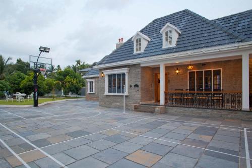 Kozhikode Villa | StayVista at The Stone Villa with Basketball Court