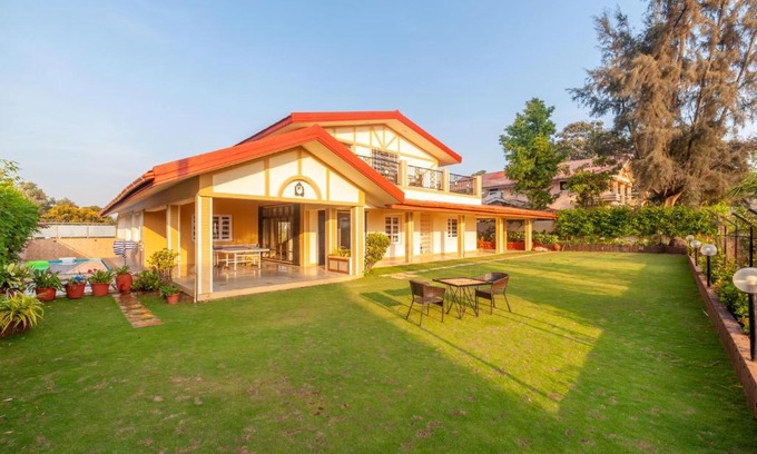 Kune Village Villa | StayVista's V Square - Enjoy a pool and indoor games for a leisurely stay