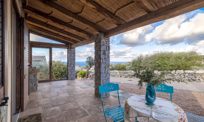 Trinita d'Agultu Apartment | Studio Apartment 'Stazzo Jana' with Sea View, Private Terrace and Air Conditioning