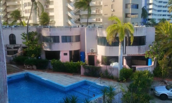 Margarita Island Apartment | Studio apartment in front of C.Cial La Vela, near the beach, with swimming pool and 24 hour security.