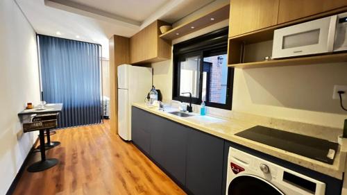 Bage Apartment | Studio Central Todo Planejado com Ar Condicionado