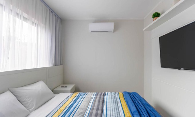 Civic Center Apartment | Studio com 2 quartos e 2 Camas casal - SBO006