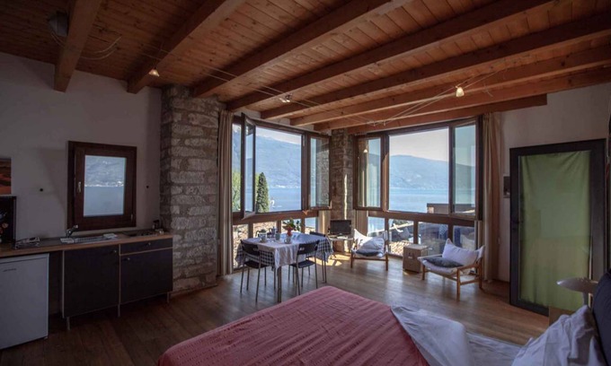 Tignale Apartment | Studio rustically furnished, overlooking lake and with terrace