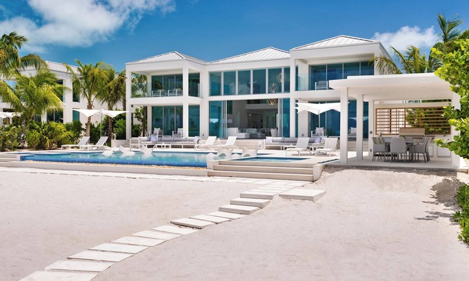 Grace Bay West Villa | Stunning beachfront villa with 2 stories of windows to take in the ocean view - Seaclusion
