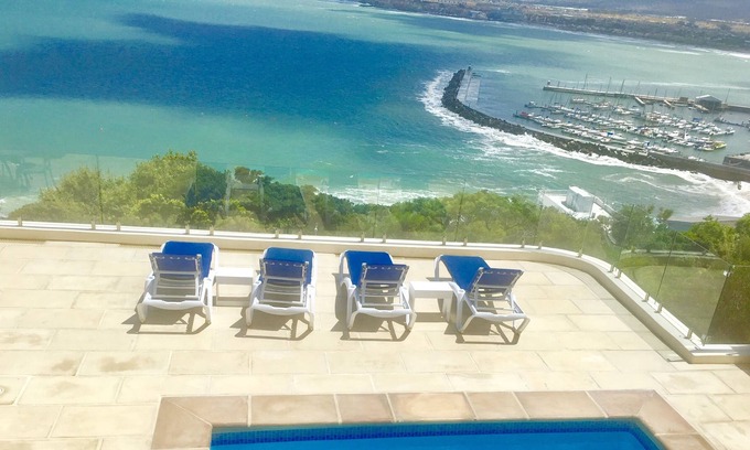 Mountainside Apartment | Stunning ocean views of False bay the harbour with Private pool