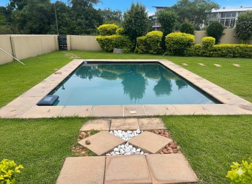 Nelspruit Apartment | Stylish Riverside Home with Pool, Braai & Wi-Fi