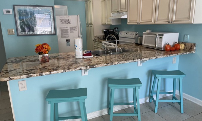 Orange Beach Condo | Sugar Beach 1st floor, Unit 132, 2BR/2BA, Side Gulf View, 3 Pools, 1 Kiddie Pool