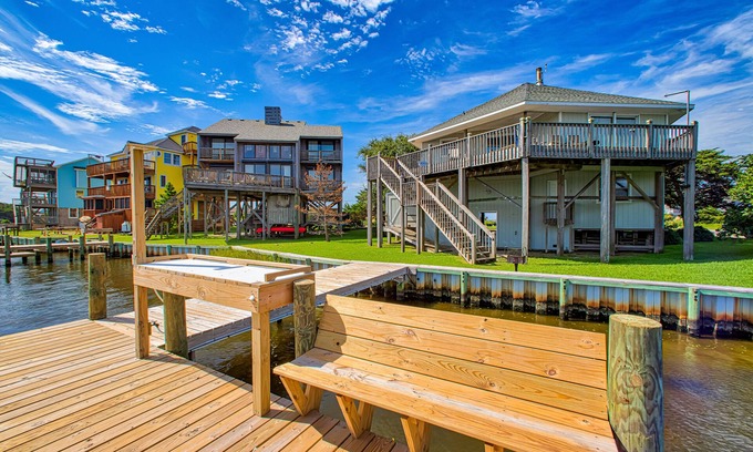 Brigands' Bay House | Sunny canal-front home w/deck, boat dock, private washer/dryer, & central AC