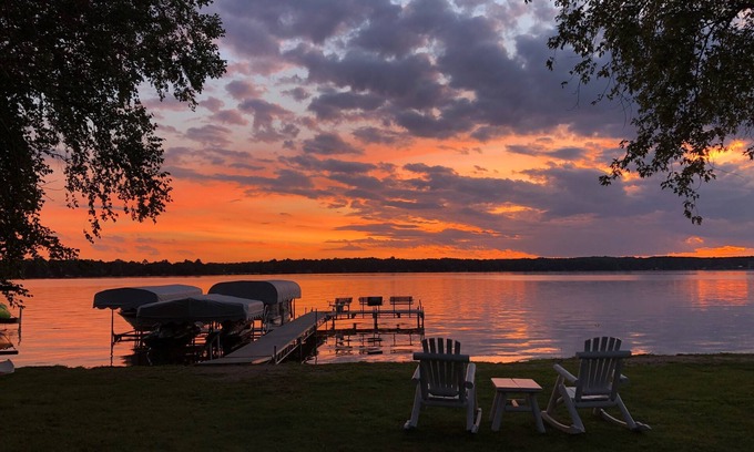 Amery Cabin | Sunset Cottage on Lake Wapogasset, Amery WI with Bunk Room, Hot Tub, AC, & more