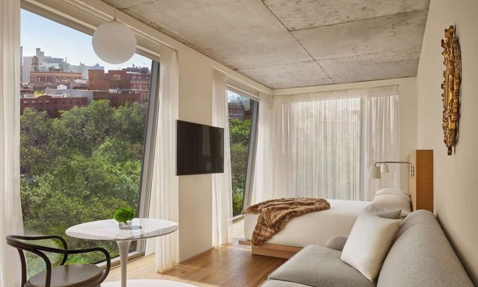 Bowery Hotel | Superior Comfort in the City: Elegant Suites with Panoramic City Views