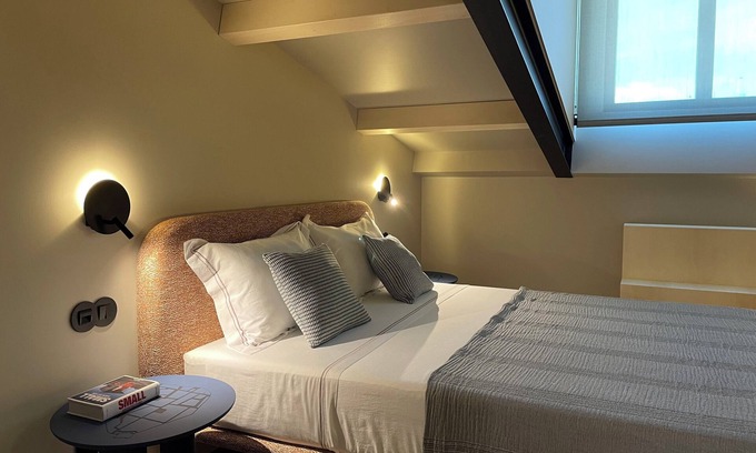 Braga Hotel | SUTRooms - Orange Room by Quantique