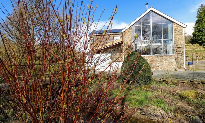 Llandrindod Wells Cottage | THE BARN AT GLANOER, pet friendly, with open fire in Hundred House