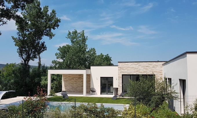 Saint-Julien-de-Peyrolas Villa | The contemporary Beau Soleil will seduce you with its elegance and its environment.