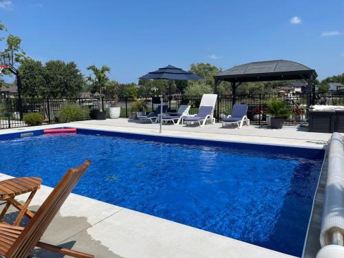 Lakeshore House | The Grand River Retreat with heated Pool & hot tub